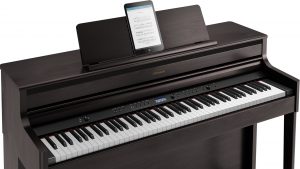 Roland HP704 digital piano